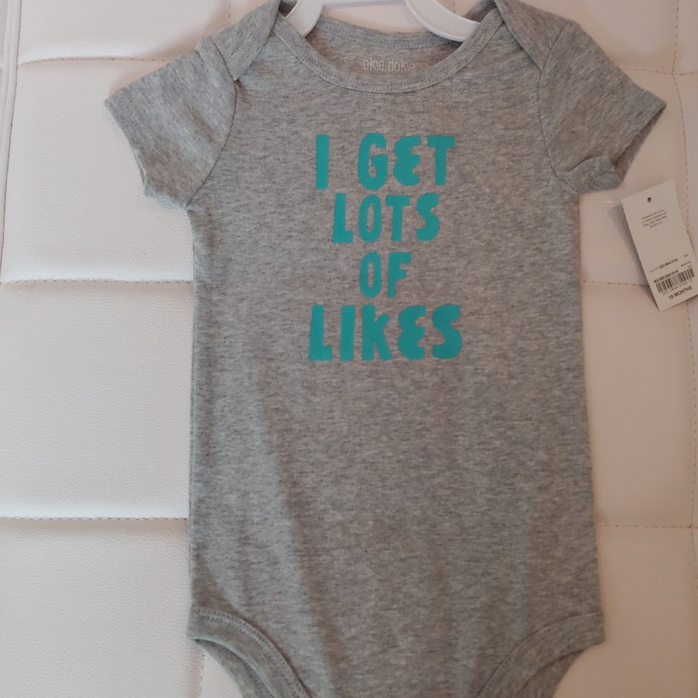 NWT Graphic Onesie "I Get Lots Of Likes"